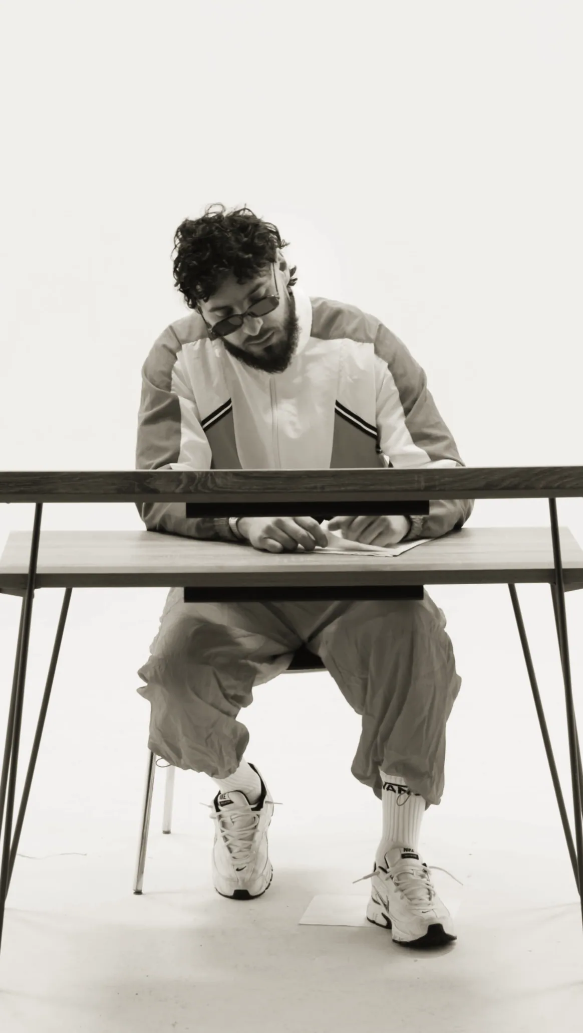 Young Benny at a desk - editorial studio shoot