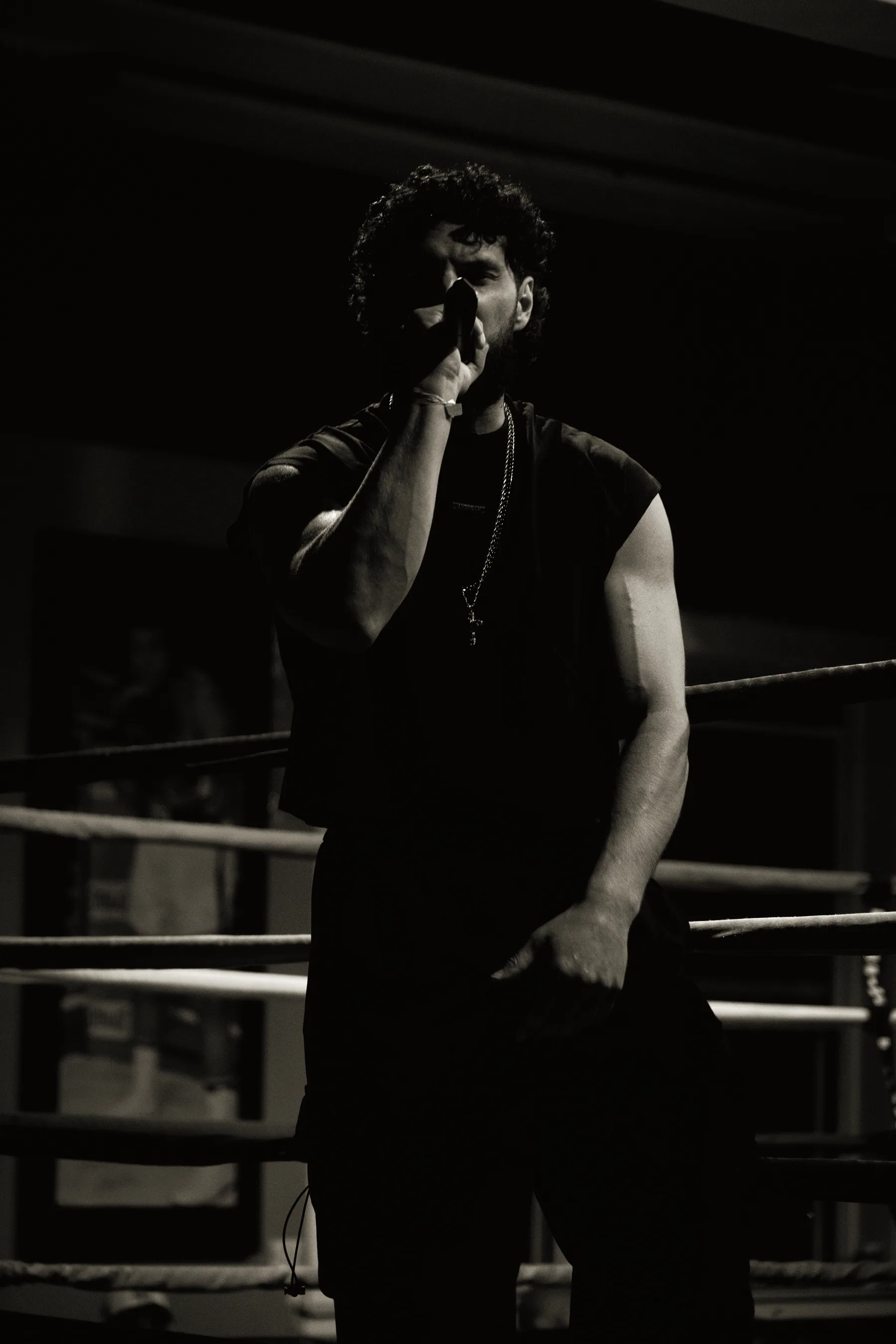 Young Benny performing ringside - stage lights over the ropes